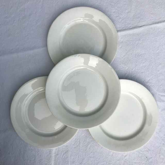Lot of four digoin white plates