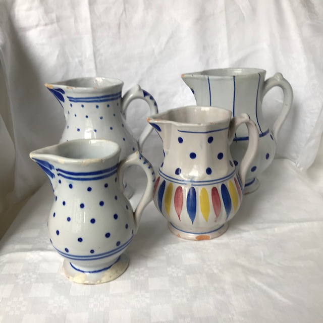 Set of four assorted jugs