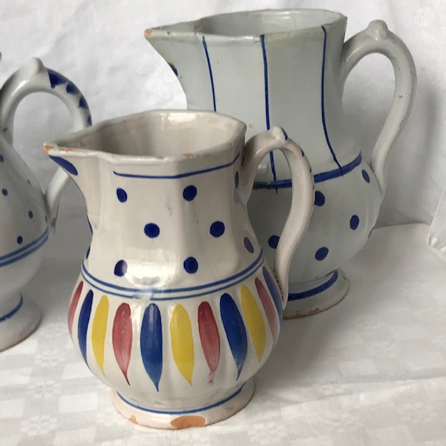 Set of four assorted jugs