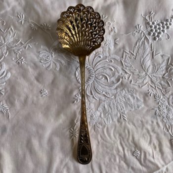 Silver sprinkling spoon