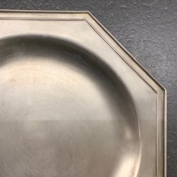 Old pewter octagonal plates