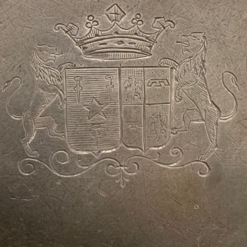 Pewter plate decorated with a coat of arms