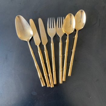 Set of bamboo cutlery in golden metal
