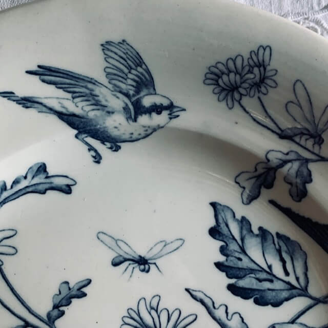Earthenware plates decorated with birds
