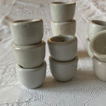 White earthenware snail pots